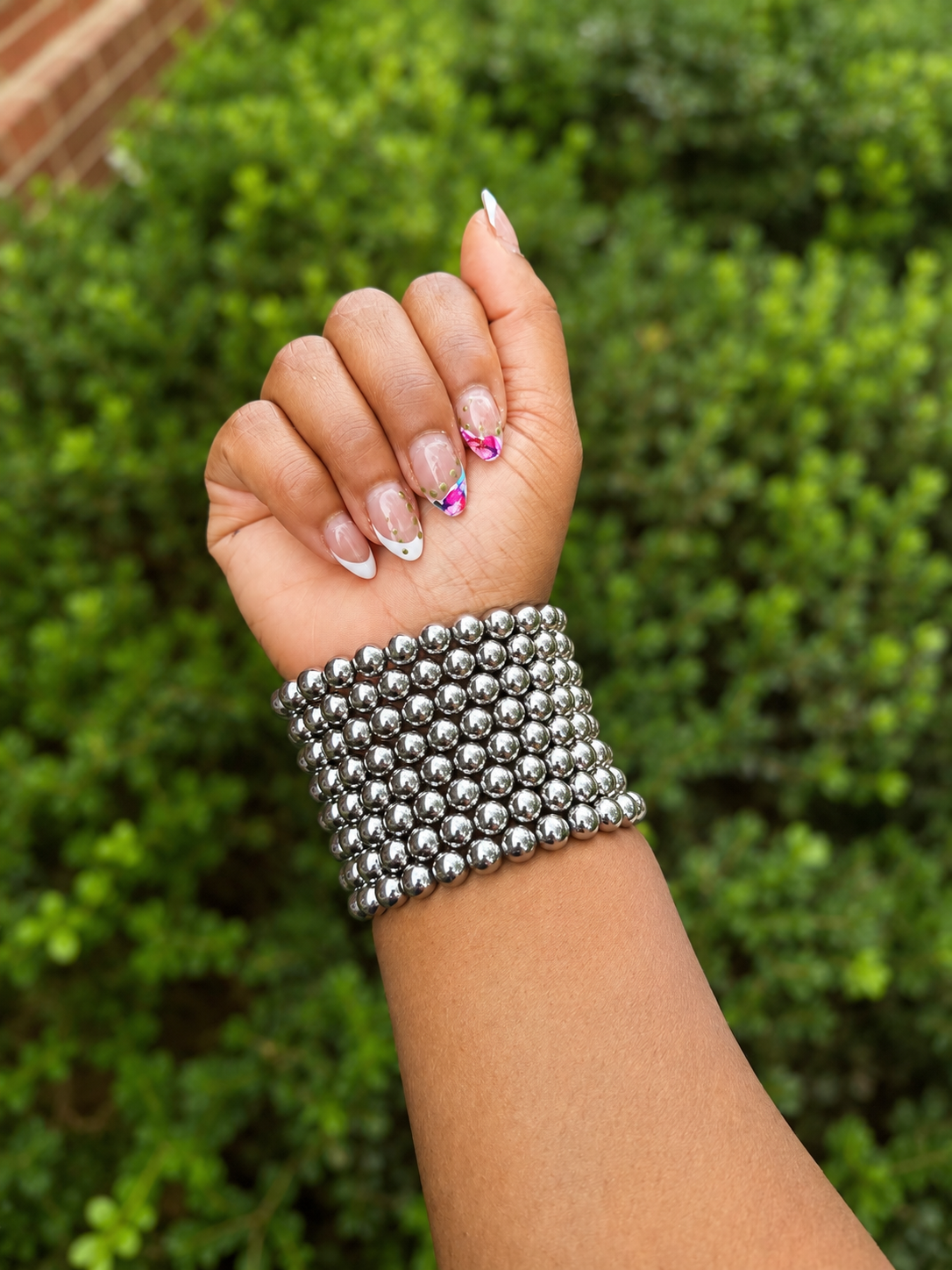 Titan chrome bracelet-SILVER.        *$22 per bracelet-you need to purchase more than 1 for the stacked look*