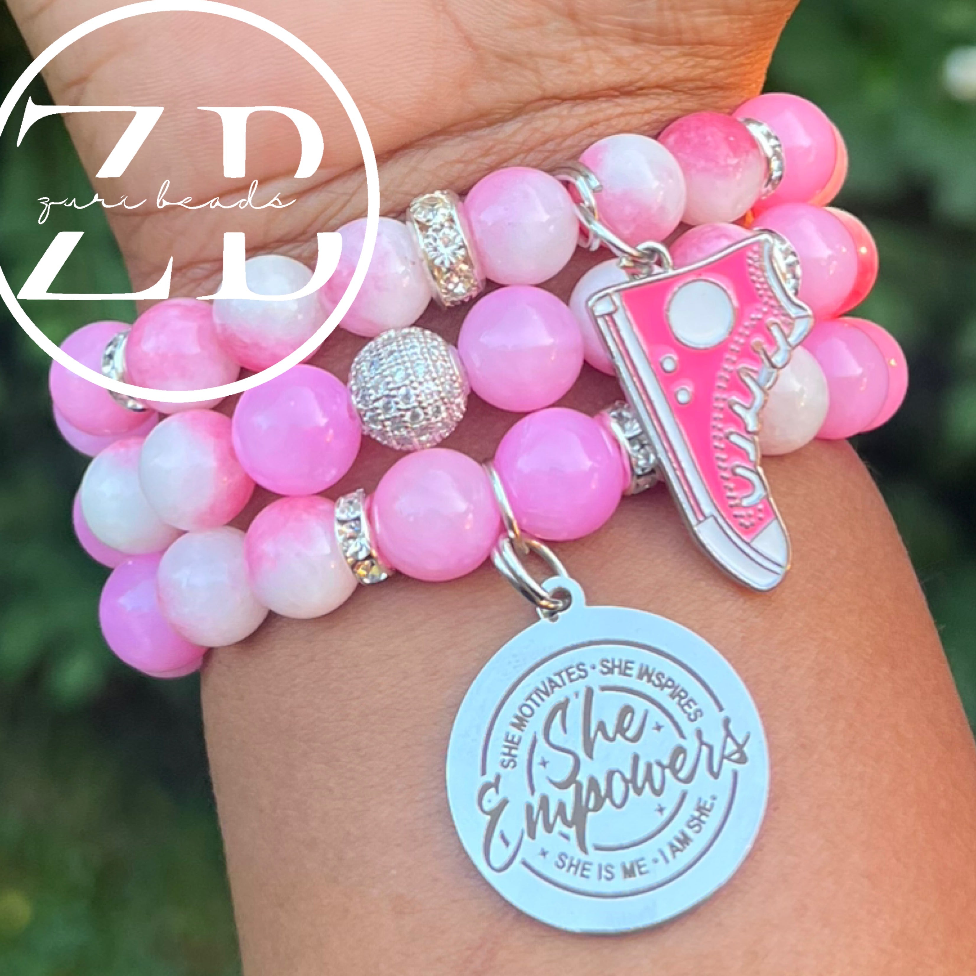 She empowers (pink)