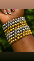 Titan chrome bracelet-GOLD.        *$22 per bracelet-you need to purchase more than 1 for the stacked look*