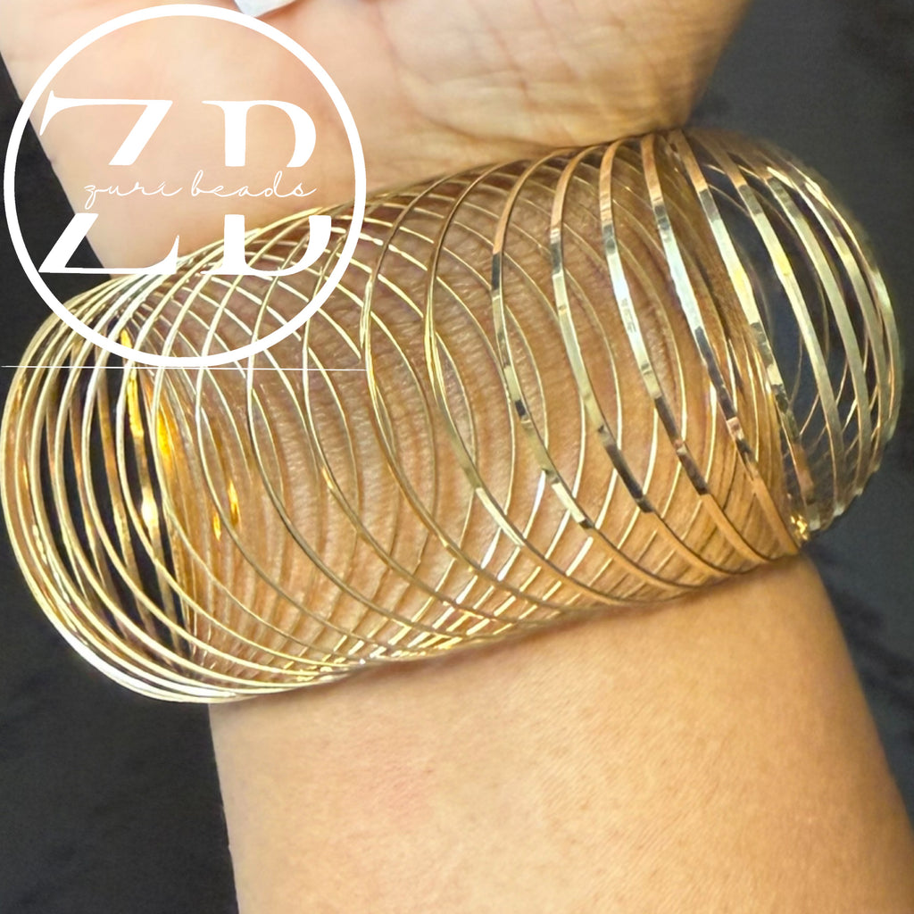 Gold slinky bracelet ($25 per bracelet)
