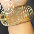 Gold slinky bracelet ($25 per bracelet)