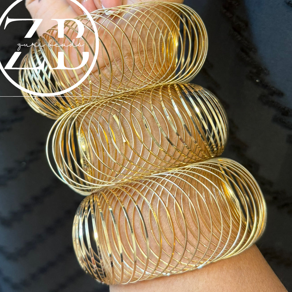 Gold slinky bracelet ($25 per bracelet)