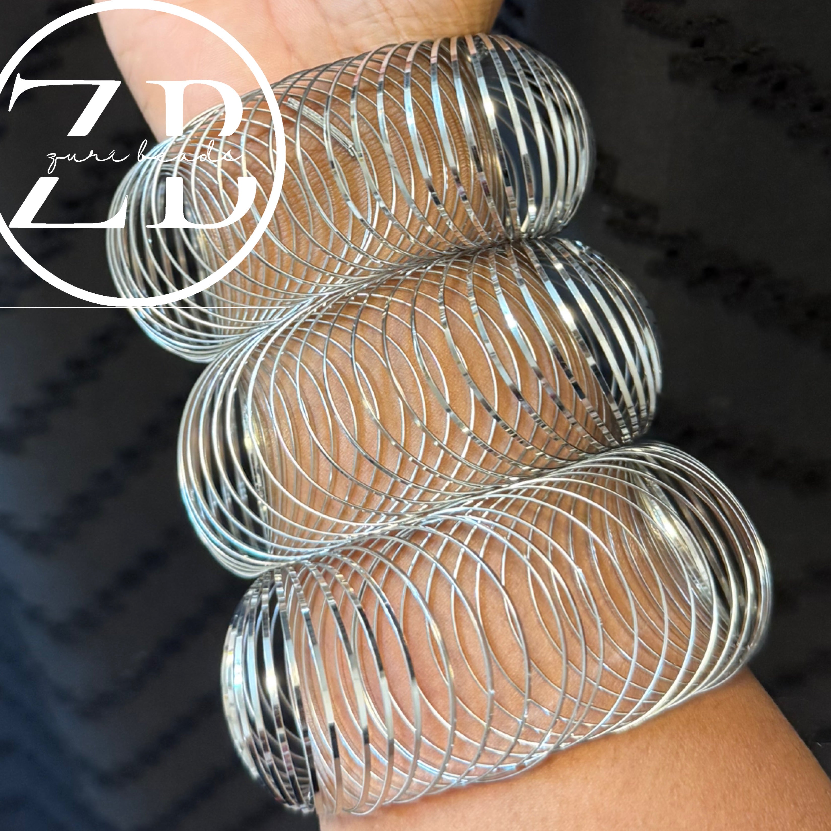 Silver slinky bracelet ($25 per bracelet) (Copy)