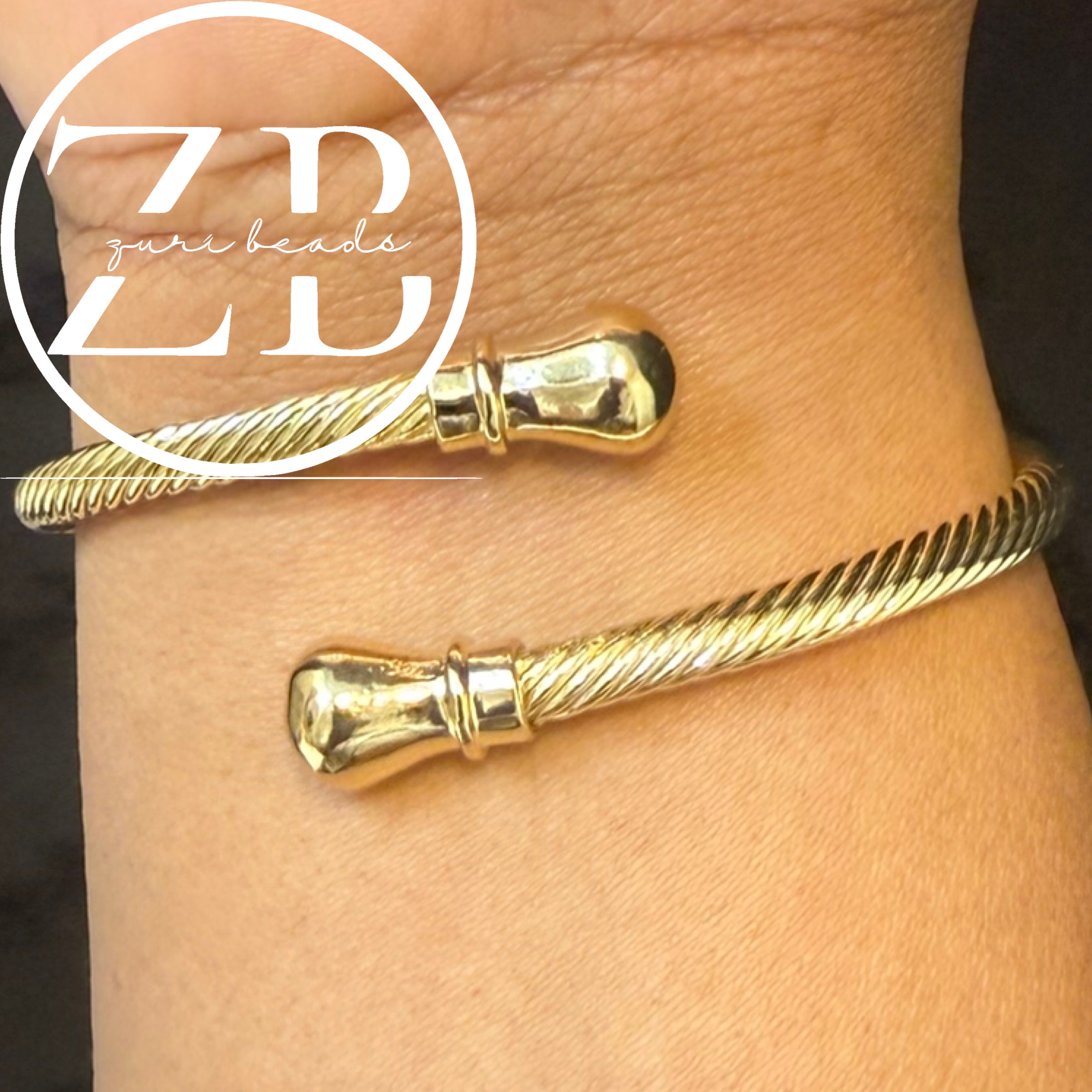 Twisted gold bangle