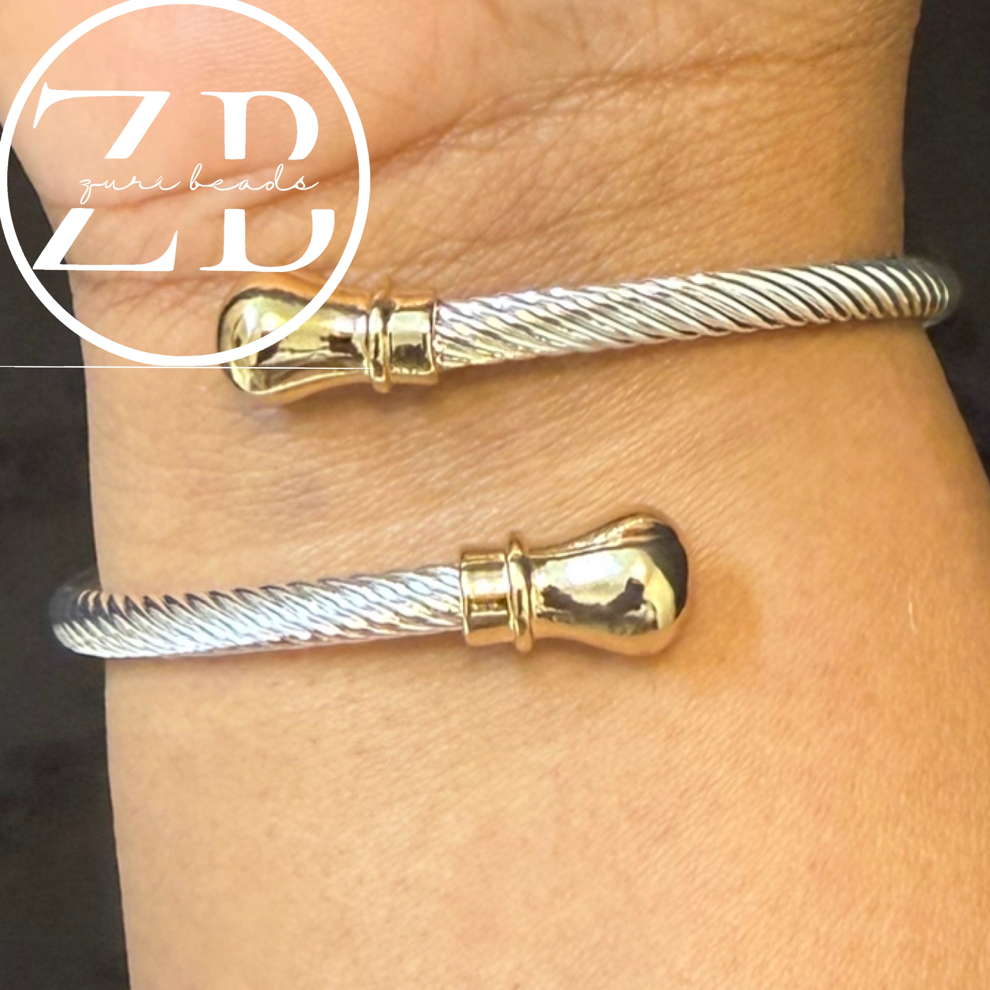 Twisted gold and silver bangle